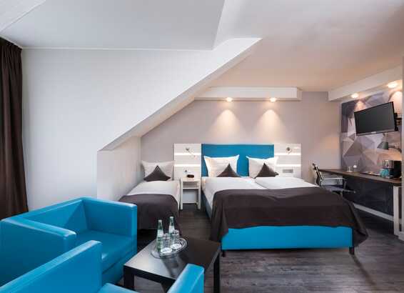 Entdecken Sie das geräumige Familienzimmer im Best Western Hotel cologne Airport Troisdorf, ideal für Reisende mit Kindern.