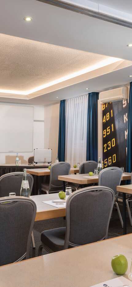 Our meeting room at Best Western Hotel Cologne Airport Troisdorf, ideal for training sessions and seminars in a classroom setup. Provides an optimal learning environment with comprehensive equipment for successful events.