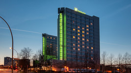 Holiday Inn Hotel Berlin City East exterior at night time
